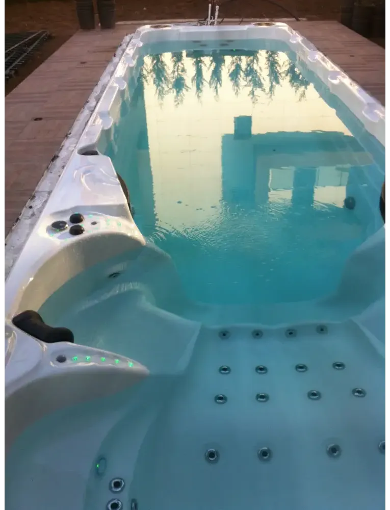 PassionSpa Aquatic 6 swim spa – white acrylic, turquoise water, integrated massage jets